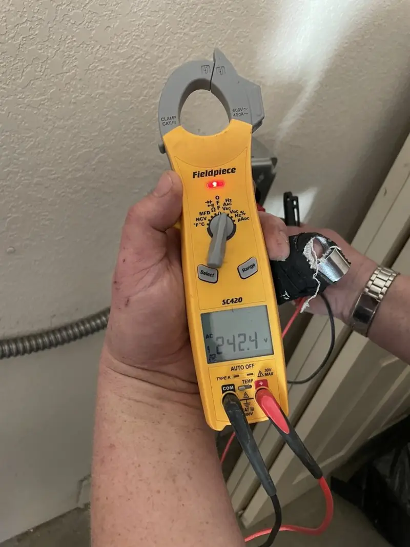 Voltage testing with clamp meter during Generator Installation in Clare
